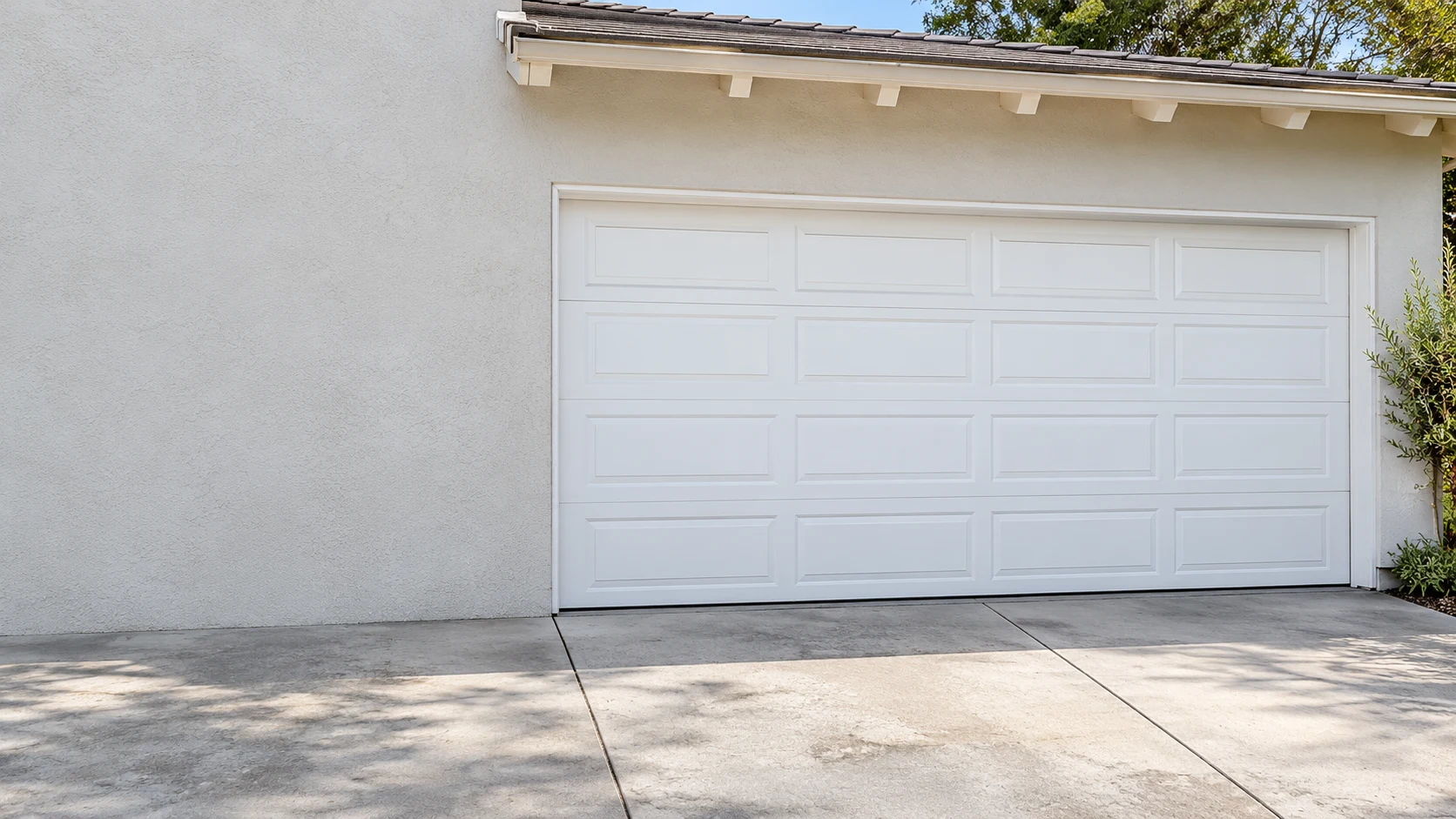 AI-generated architectural illustration of a sectional garage door and driveway, not a customer project